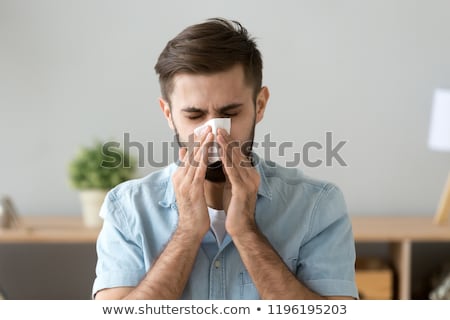 Сток-фото: Man Caught A Cold And Chills His Fever