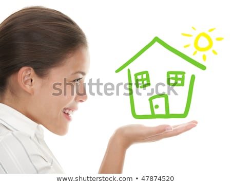 Сток-фото: Green House In Woman Hand Isolated On White Background Real Est