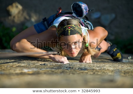 Сток-фото: Climbing On The Mountain Female Doing Extreme Sport