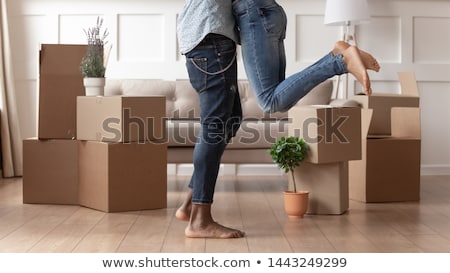 Stock photo: Happy Couple With Stuff Moving To New Home