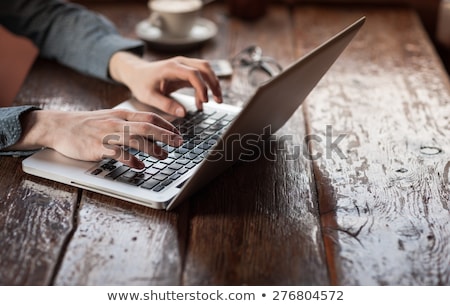 Stock photo: The Male Hands With A Laptop And The Cup