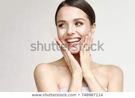 Stock photo: Face And Hands Of Beautiful Woman
