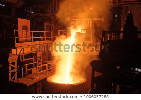 Foto d'archivio: Hot Steel Pouring In Steel Plant