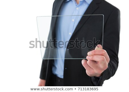 Stock fotó: Mid Section Of Businessman Holding Transparent Interface