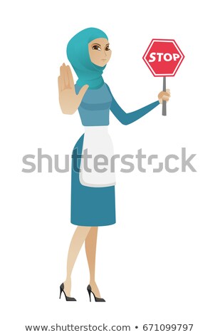ストックフォト: Young Muslim Cleaner Holding Stop Road Sign