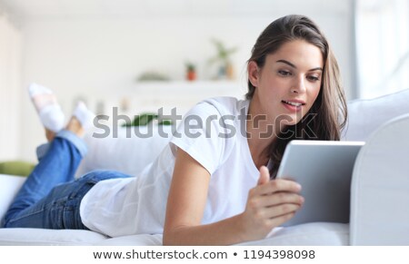 Stock foto: Woman Resting With Tablet Computer