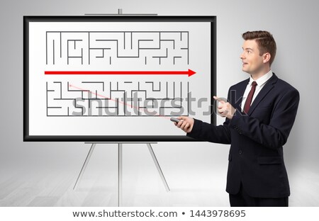 Сток-фото: Businessman Presenting Potential Exit From A Labyrinth