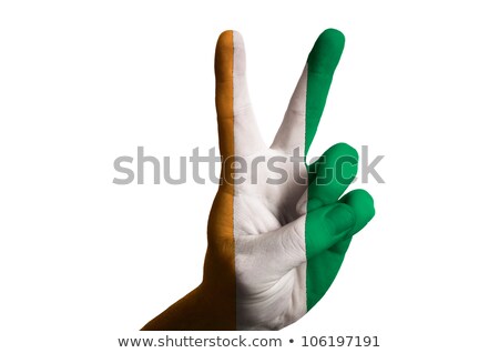 Сток-фото: Ivory Coast National Flag Two Finger Up Gesture For Victory And