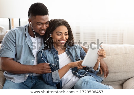 Stock photo: Sharing Headphones