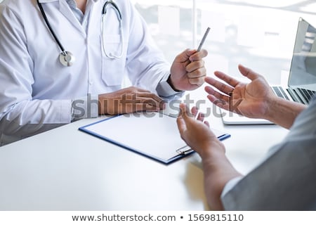 Stock foto: Doctor Consulting Patient And Recommend Treatment Methods And Ho