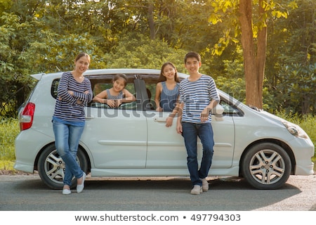 Foto stock: Summer Family Portrait Of Parents And Kids Outside In Urban Style