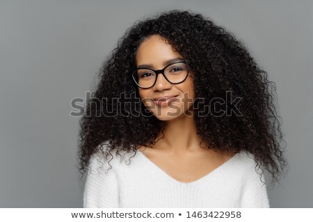 Stok fotoğraf: Close Up Shot Of Beautiful Happy Afro Woman With Bushy Curly Hair Embraces Favourite Dog And Have F