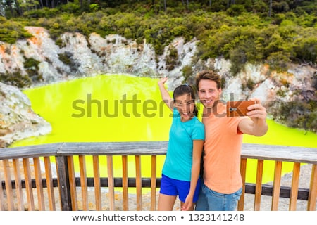 Foto stock: New Zealand Tourist Attraction Couple Tourists Taking Selfie Travel Destination Waiotapu Active Ge