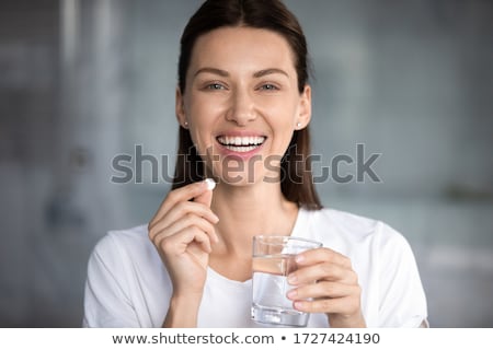 Foto stock: Young Beautiful Woman With Pills