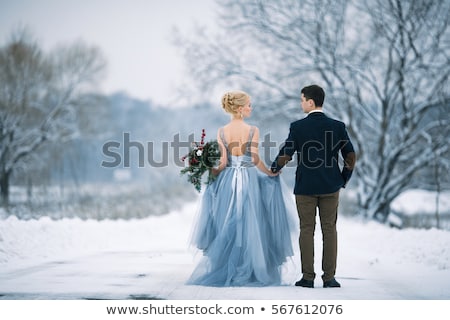 Stock fotó: Blond Woman Holding Hands At The Back