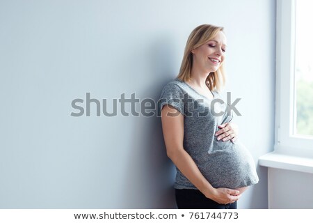 Stock fotó: Maternity Pregnant Smiling Woman In Nature Expecting Baby