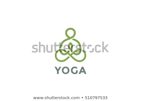 Foto stock: Man Exercising Yoga And Spa Symbol