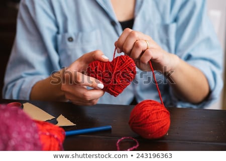 Stockfoto: Closeup On Red Heart Made From Wool In Hand Of Woman