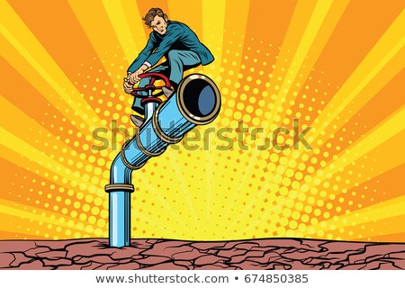 Stok fotoğraf: Water Pipe During A Drought Retro Businessman On The Tube