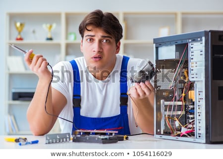 Foto stock: Computer Hardware Repair And Fixing Concept By Experienced Techn