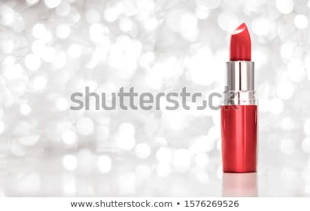 ストックフォト: Coral Lipstick On Silver Christmas New Years And Valentines Day
