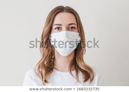 Stockfoto: Portrait Of A Beautiful Girl With White Mask