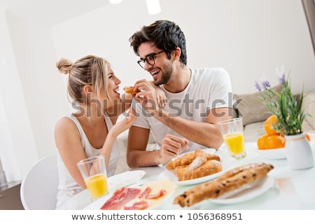 Stockfoto: Couple Enjoying Breakfast In Bed