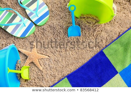 [[stock_photo]]: Beach Accessories Towels Toys And Starfish