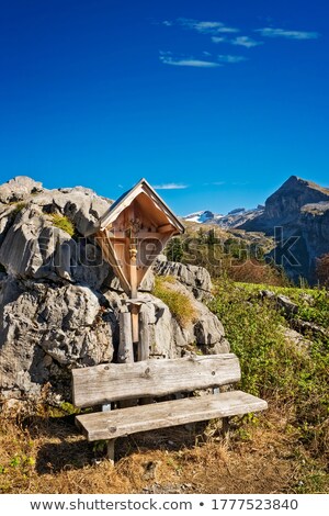 Stockfoto: Wayside Shrine And Bench In The Mountains