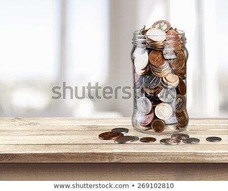 Foto stock: Arro · de · monedas · rebosante