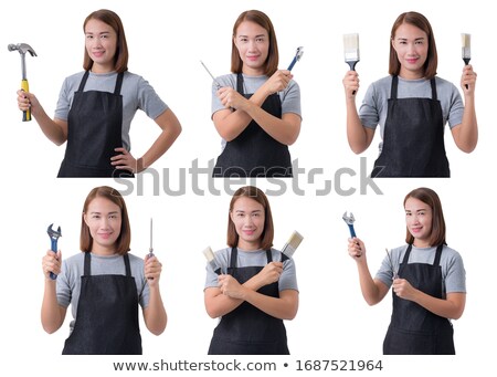 Сток-фото: Young Woman With A Hammer