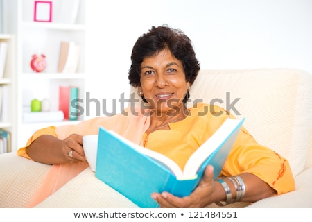 Stok fotoğraf: Indian Mature Woman Reading Book