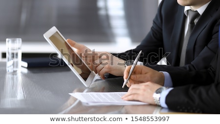 Stok fotoğraf: Young Businessman Using Tablet Computer