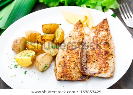 Crispy Spiced Mackerel With Potatoes Stockfoto © Vankad