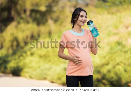 Zdjęcia stock: Young Pregnant Woman In The Summer Park