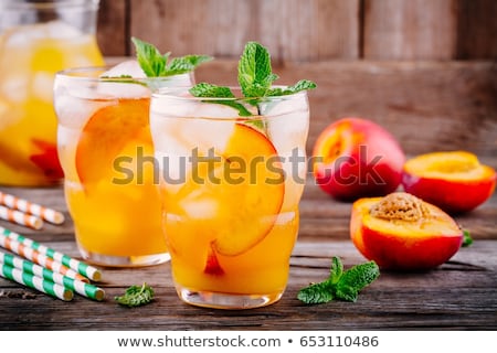 Foto d'archivio: Homemade Lemonade With Ripe Peaches And Fresh Mint Fresh Peach