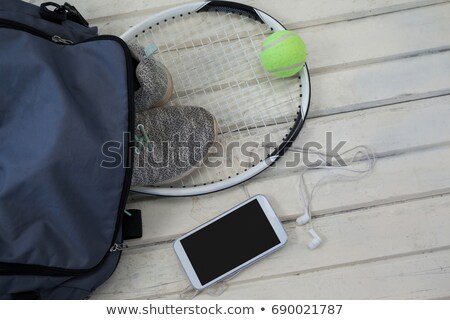 ストックフォト: High Angle View Of Smartphone With Tennis Equipment