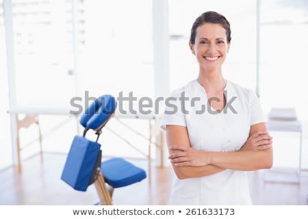 [[stock_photo]]: Therapist In The Massage Room