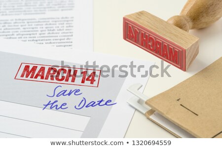 Foto stock: A Red Stamp On A Document - March 14