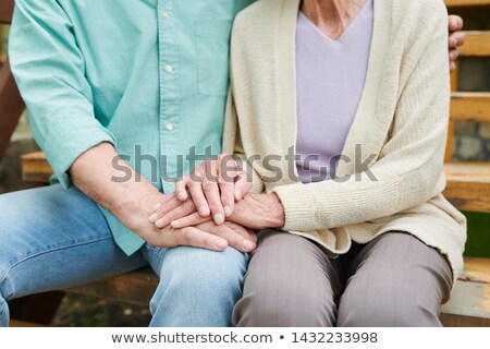 Stockfoto: Devoted Senior Husband And Wife In Casualwear Having Rest