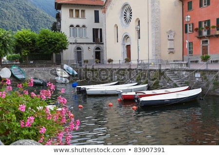 Stok fotoğraf: Boats At The Tiny Harbour Of Torno At Lake Como In Italy