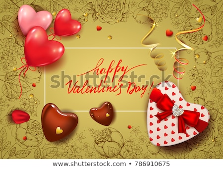 Stok fotoğraf: Red Heart Shaped Gift Box With Rose Petal