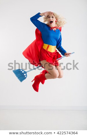 Foto stock: Superwoman With Broom