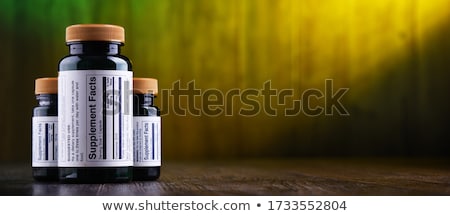 Stock photo: Composition With Dietary Supplement Capsules And Drug Pills