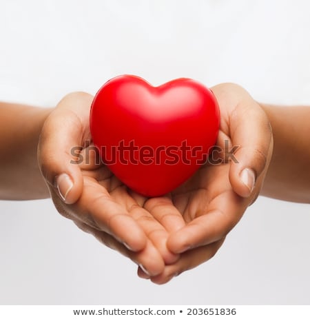 Foto stock: Expectant Mother With Red Heart