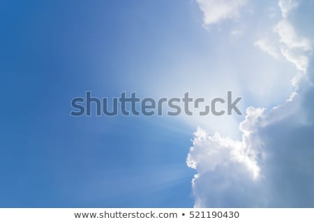 Stock fotó: Sun Rays Shining Behind Cloud In The Sky