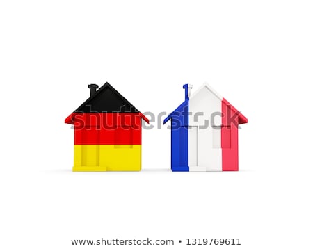 Foto stock: Two Houses With Flags Of France And Germany