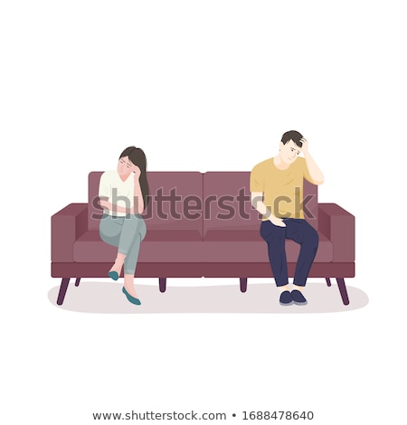 Stock fotó: Sad Couple Sitting On Sofa