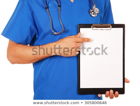 Stockfoto: Doctor Showing Clipboard With Copy Space For Your Text