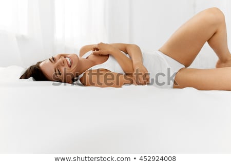 Сток-фото: Woman In Underwear On Bed